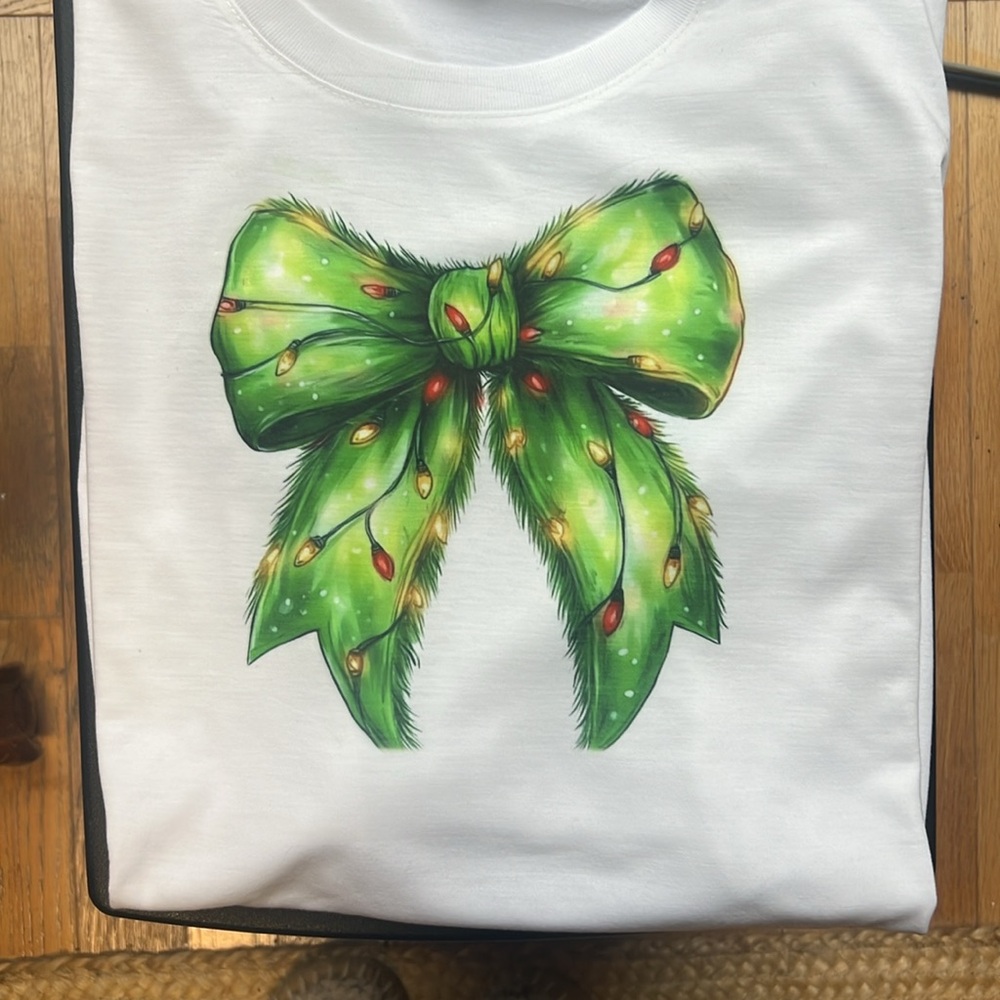 Women’s size large grinch bow shirt
